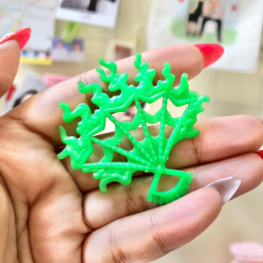 Back view of neon green Monster High spiderweb accessory