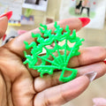 Back view of neon green Monster High spiderweb accessory