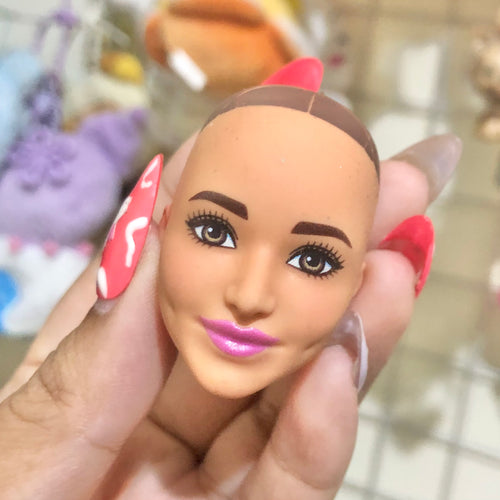 Barbie factory sample bald doll head side profile view