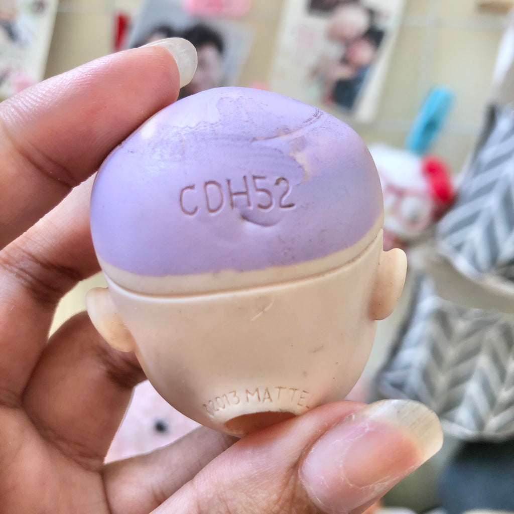 Monster High bald doll head CDH52 side angle with lavender scalp