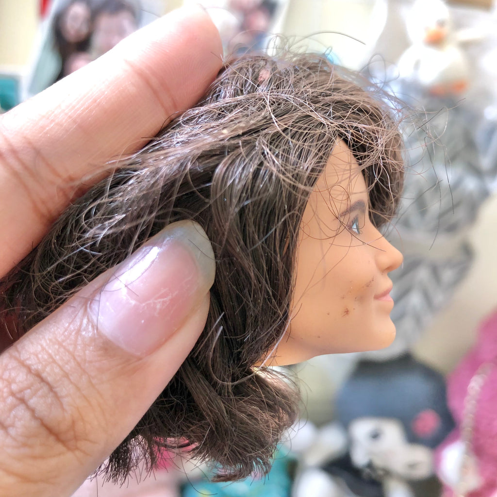 Barbie Samantha Cristoforetti doll head bottom view showing stamp